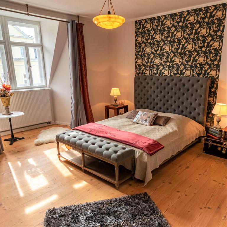 Postel nebo postele na pokoji v ubytování Ferienwohnung Anno1898 Zittau