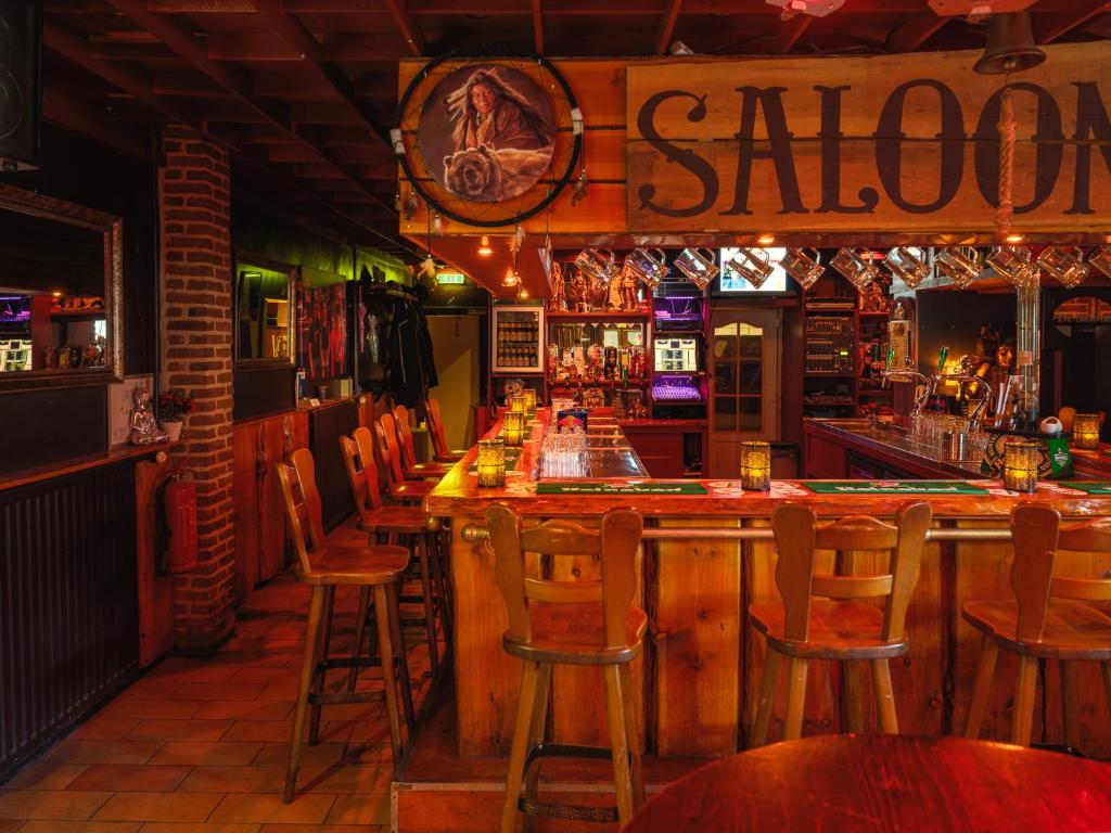 Lounge nebo bar v ubytování De Scherpenhof