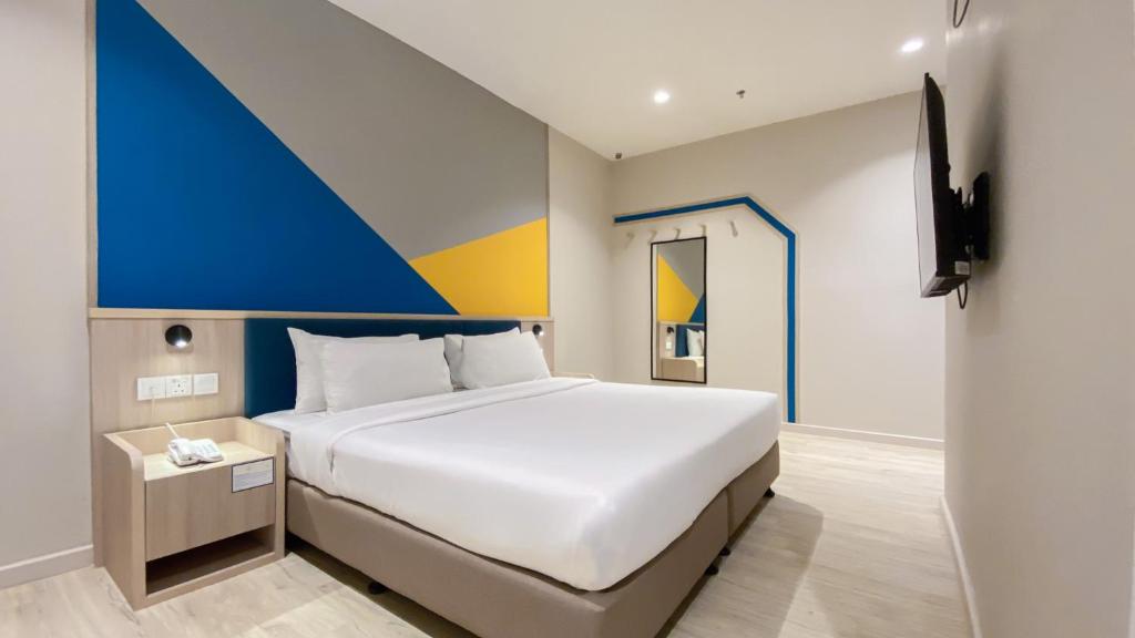 Postel nebo postele na pokoji v ubytování Fives Hotel Meldrum