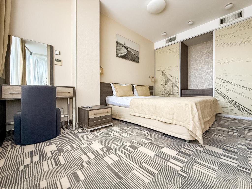 Postel nebo postele na pokoji v ubytování 12th Floor Apartments