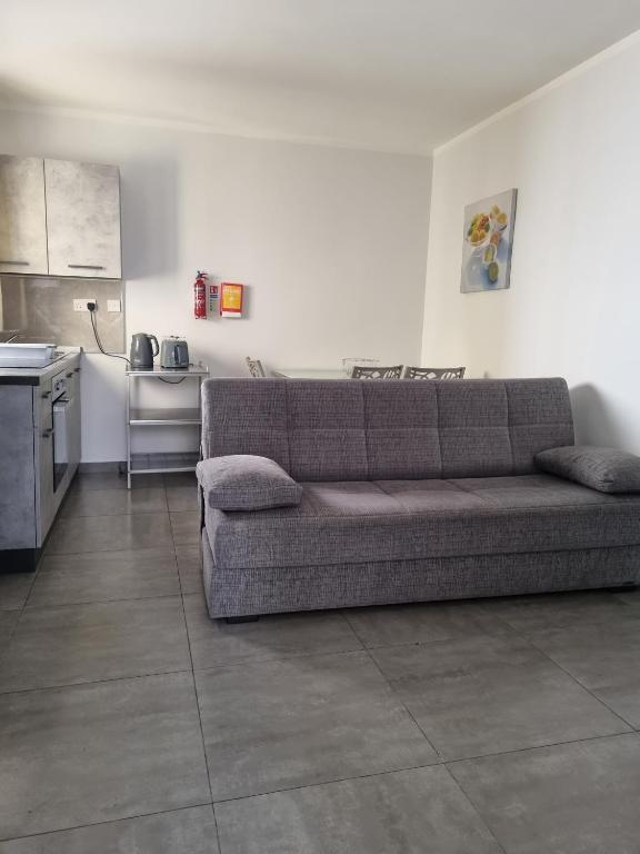 Kuchyň nebo kuchyňský kout v ubytování Central Suites