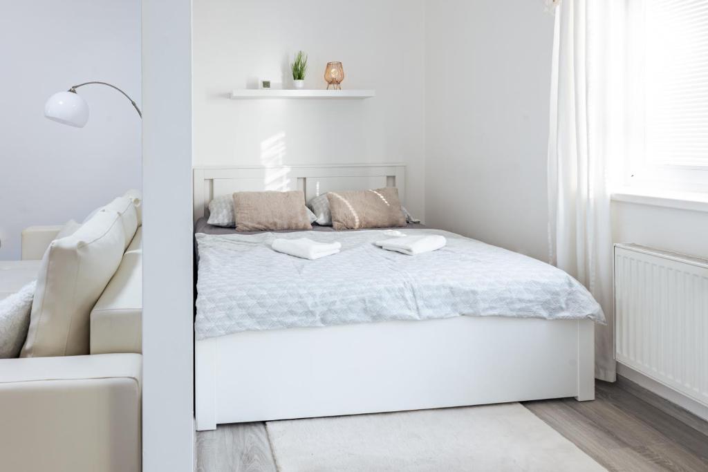 Postel nebo postele na pokoji v ubytování Apartmán v Srdci Náchoda