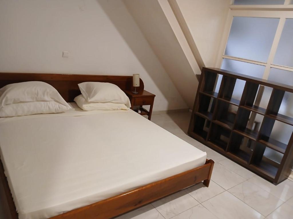 Postel nebo postele na pokoji v ubytování Paraiso 162E