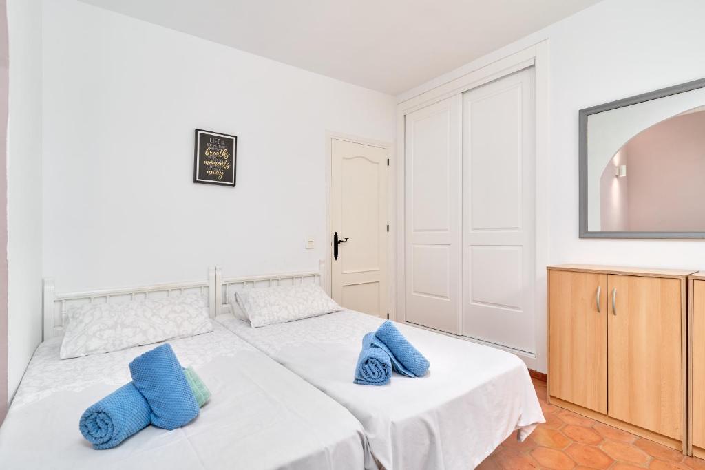 Postel nebo postele na pokoji v ubytování Villa La Chinita