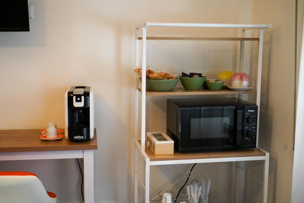 A kitchen or kitchenette at B&B La Dimora di Rosa