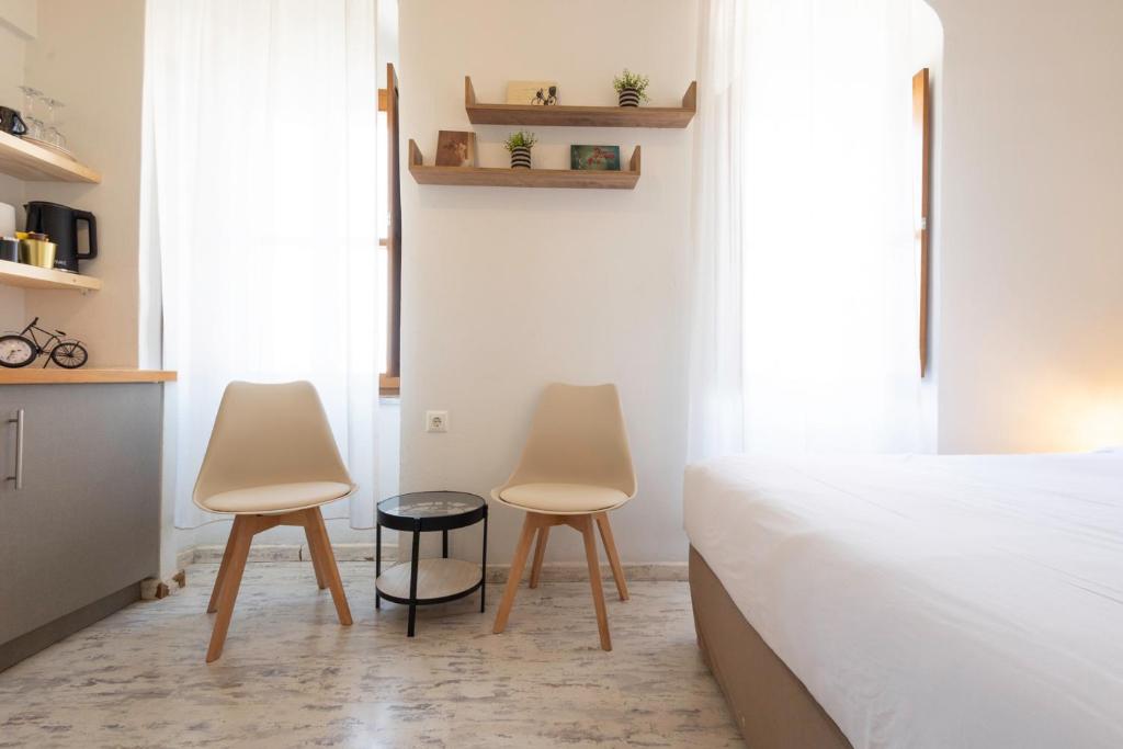 Posteľ alebo postele v izbe v ubytovaní Sophia Areopoli Guesthouse