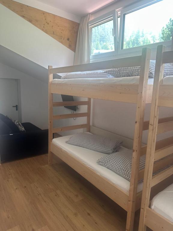 Postel nebo postele na pokoji v ubytování Waldhaus Talblick