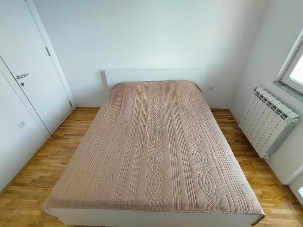 Postel nebo postele na pokoji v ubytování DB Apartment