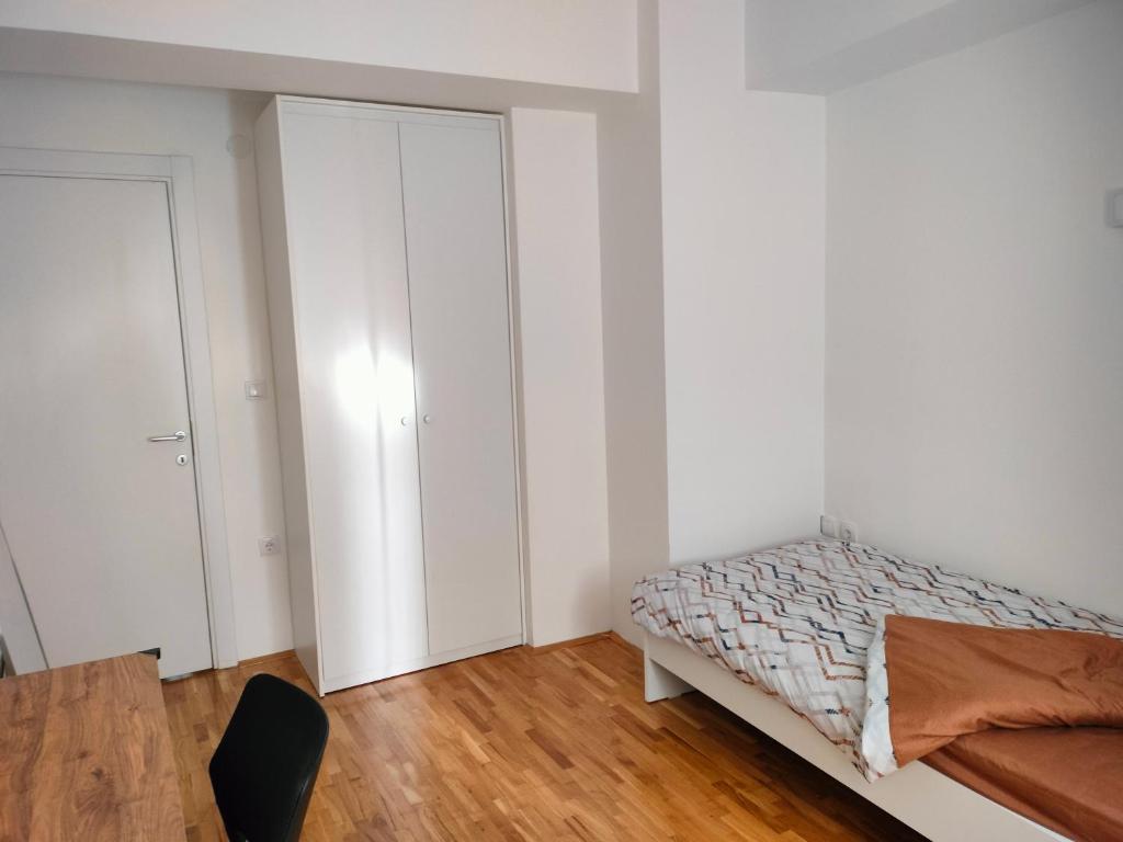 Postel nebo postele na pokoji v ubytování DB Apartment