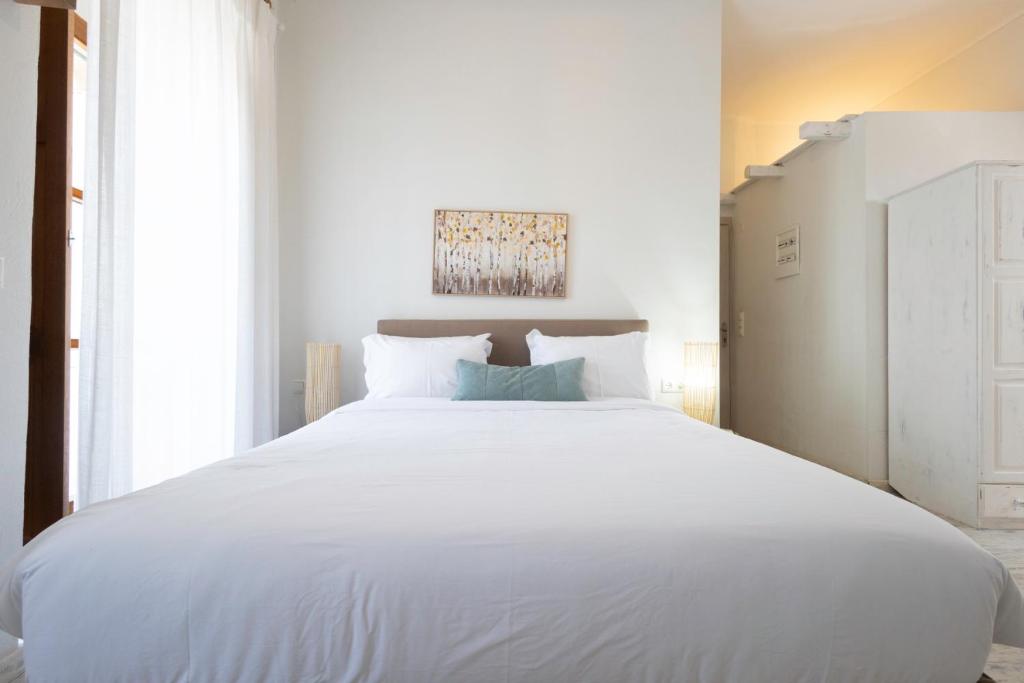 Posteľ alebo postele v izbe v ubytovaní Sophia Areopoli Guesthouse