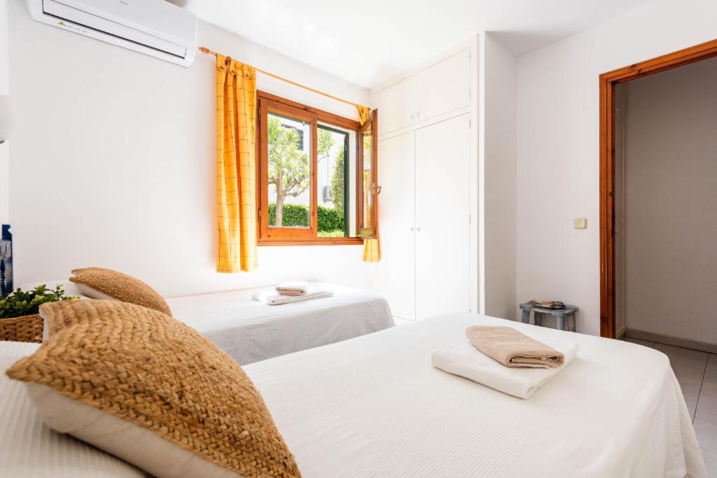 Postel nebo postele na pokoji v ubytování Villa Vista Alegre - Cala Galdana