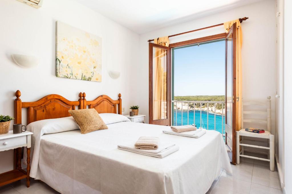 Postel nebo postele na pokoji v ubytování Villa Vista Alegre - Cala Galdana