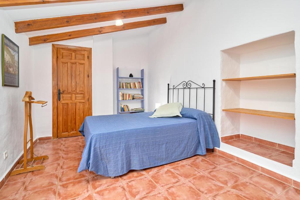 Postel nebo postele na pokoji v ubytování Casa Rural El Tesillo