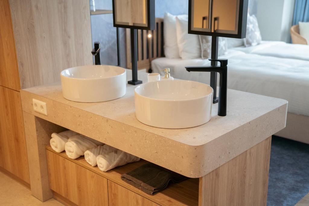 Postel nebo postele na pokoji v ubytování Beachfront Boutiquehotel