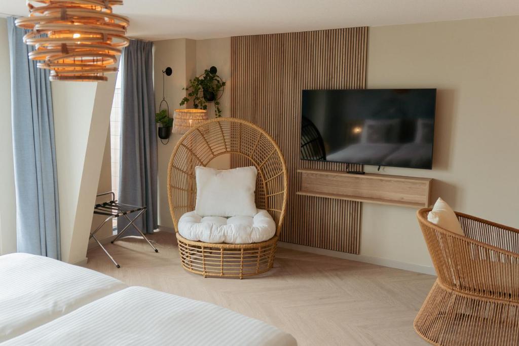 Postel nebo postele na pokoji v ubytování Beachfront Boutiquehotel