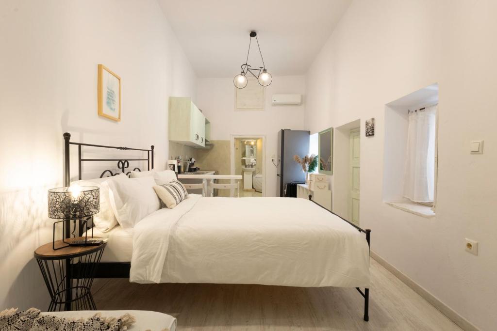 Posteľ alebo postele v izbe v ubytovaní Sophia Areopoli Guesthouse