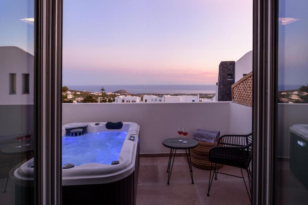 a bath tub sitting on top of a balcony at Elia Pyrgos in Pyrgos