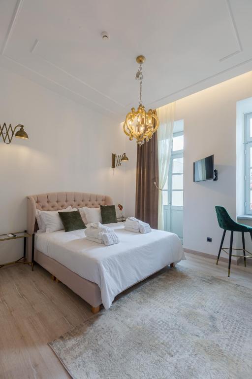 Postel nebo postele na pokoji v ubytování Residenza di Fedralia