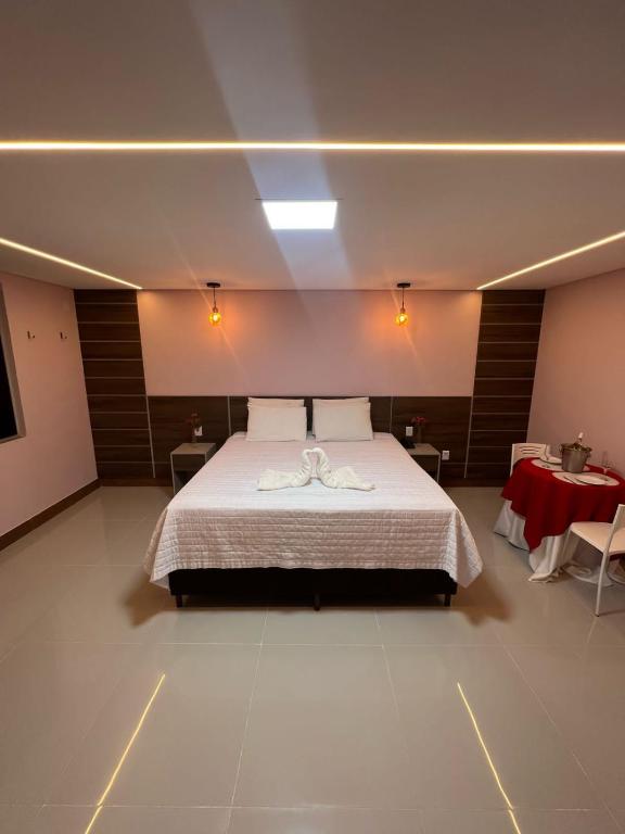 Postel nebo postele na pokoji v ubytování Hotel Absolar