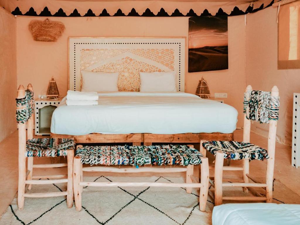 Postel nebo postele na pokoji v ubytování The Original Camp - Restaurant Dinner Show and Pool