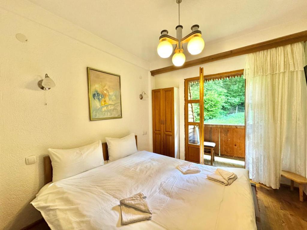 Postel nebo postele na pokoji v ubytování Hotel Oka i Po