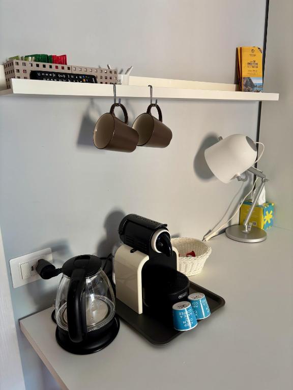 Kuchyň nebo kuchyňský kout v ubytování Evy’s Rooms