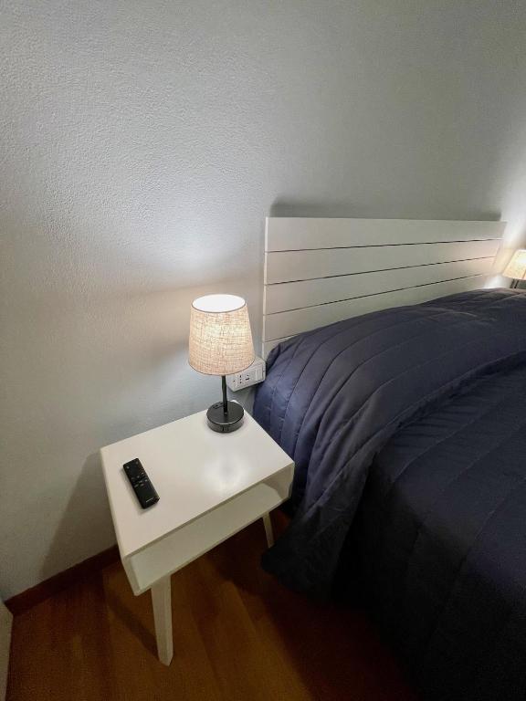 Postel nebo postele na pokoji v ubytování Evy’s Rooms
