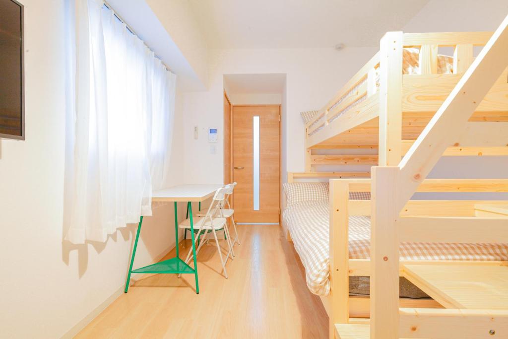 Palanda nebo palandy na pokoji v ubytování Suke Home Oshiage