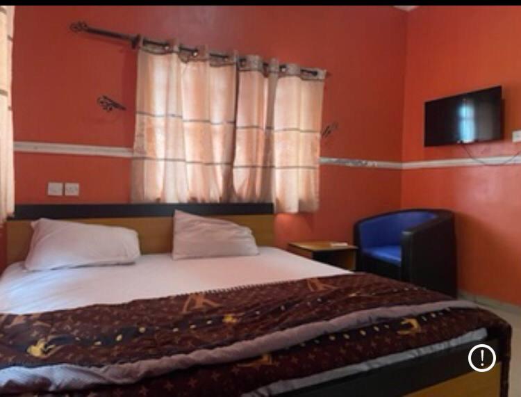 Voodi või voodid majutusasutuse Combine Picks Short Break Centre Hotel and Suite toas
