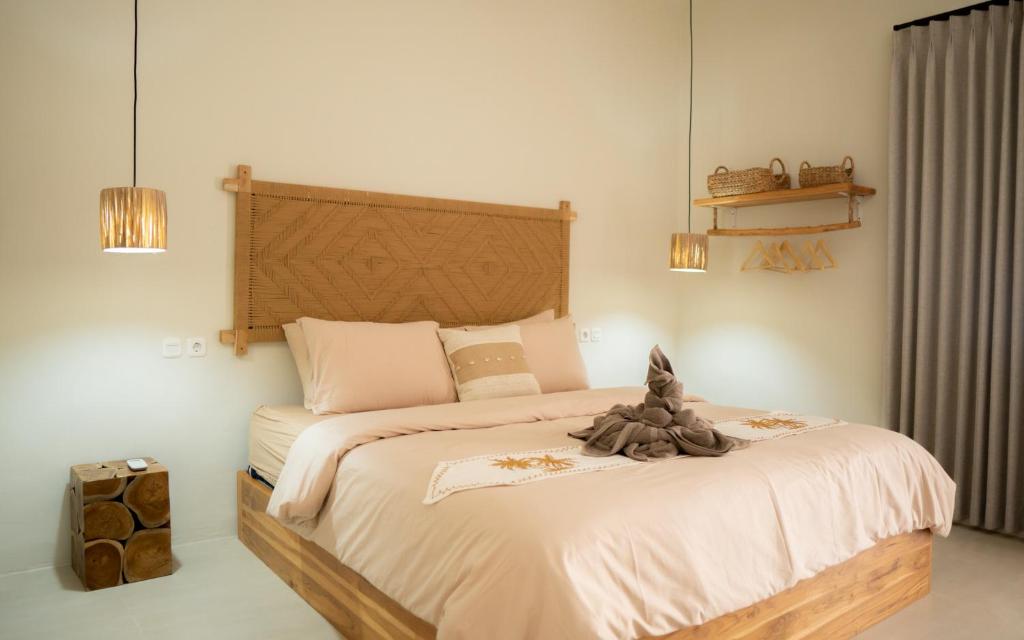 Postel nebo postele na pokoji v ubytování Casa22 Gili Trawangan