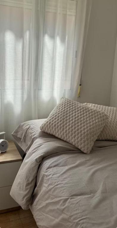 A bed or beds in a room at Warm Welcome