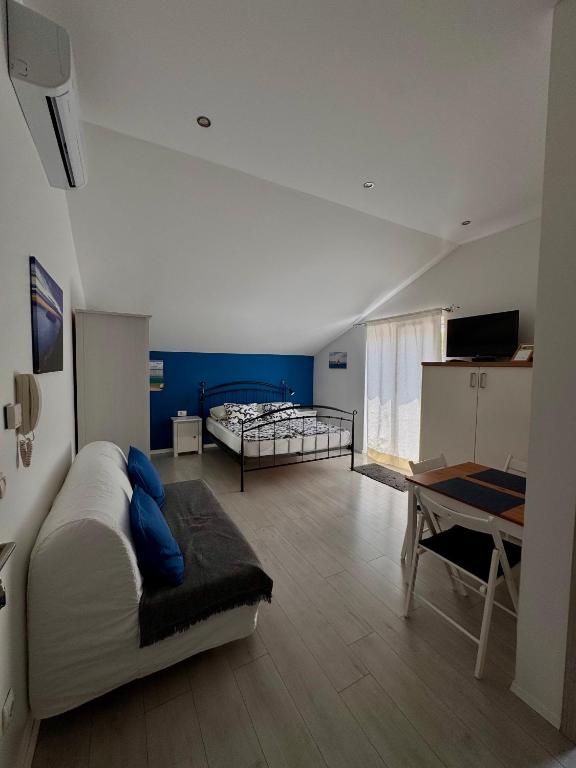 Posteľ alebo postele v izbe v ubytovaní Apartments Denis