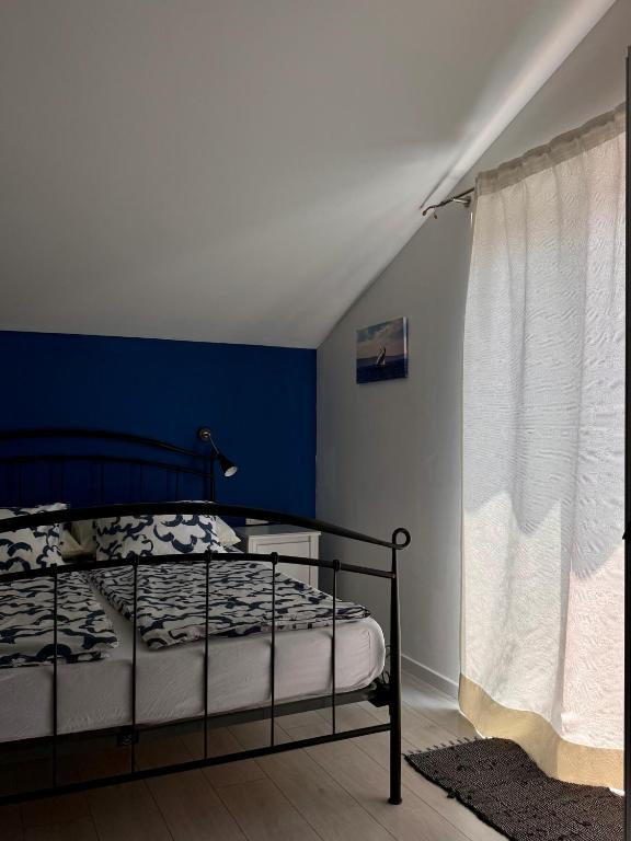 Posteľ alebo postele v izbe v ubytovaní Apartments Denis