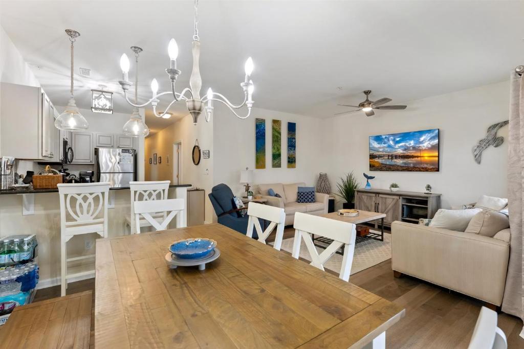 a kitchen and living room with a table and a dining room at 401 E Stanton Rd, Unit 203 in Wildwood Crest