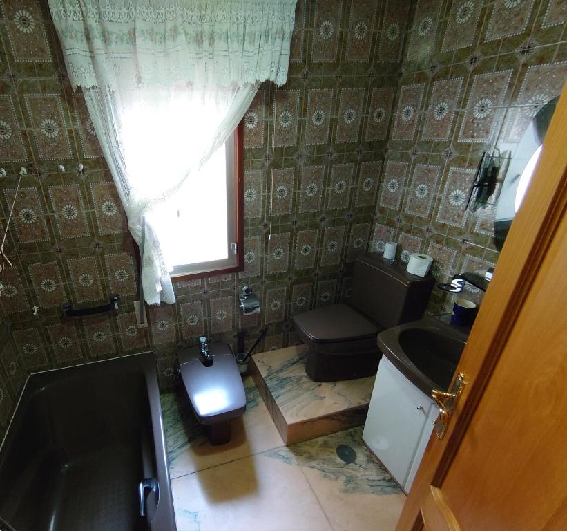 Kuchyňa alebo kuchynka v ubytovaní HOSTAL CAMELOT