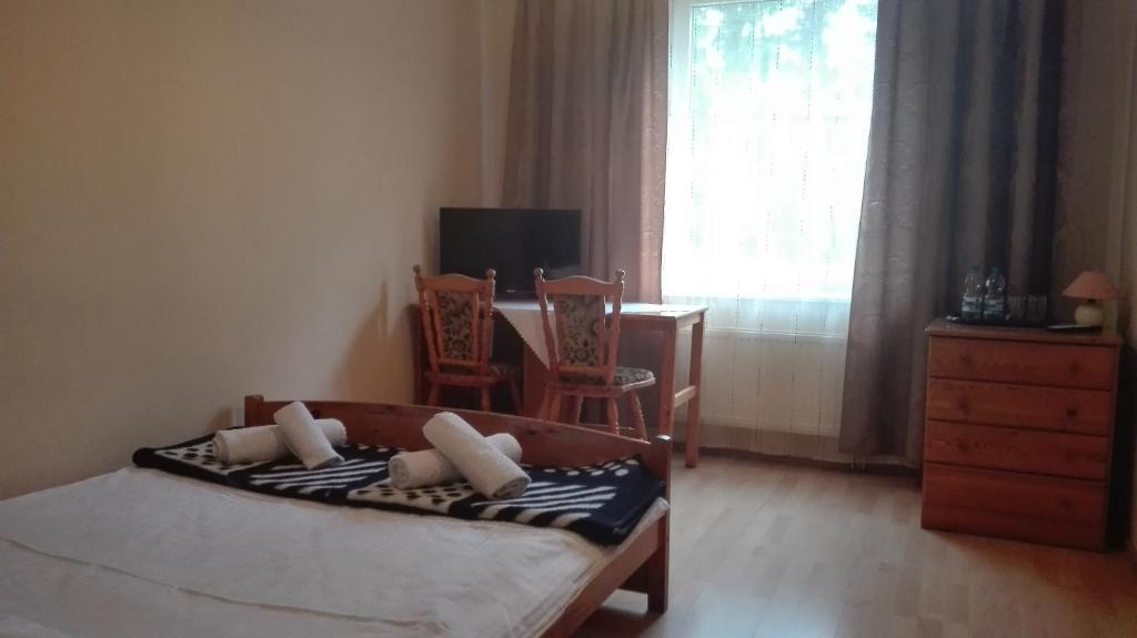 Posteľ alebo postele v izbe v ubytovaní Restauracja - Hotel Nova