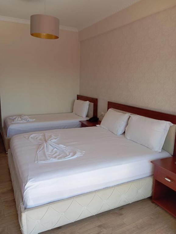 Postel nebo postele na pokoji v ubytování Hotel Summer Stars