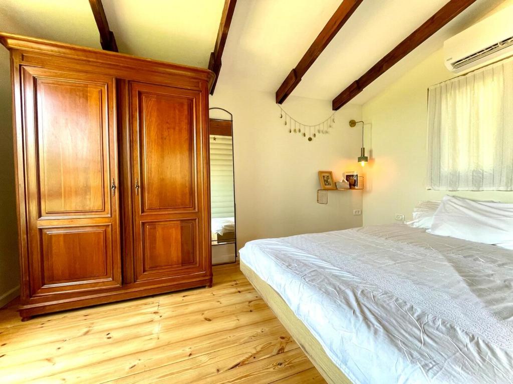 Postel nebo postele na pokoji v ubytování Solara Cabin