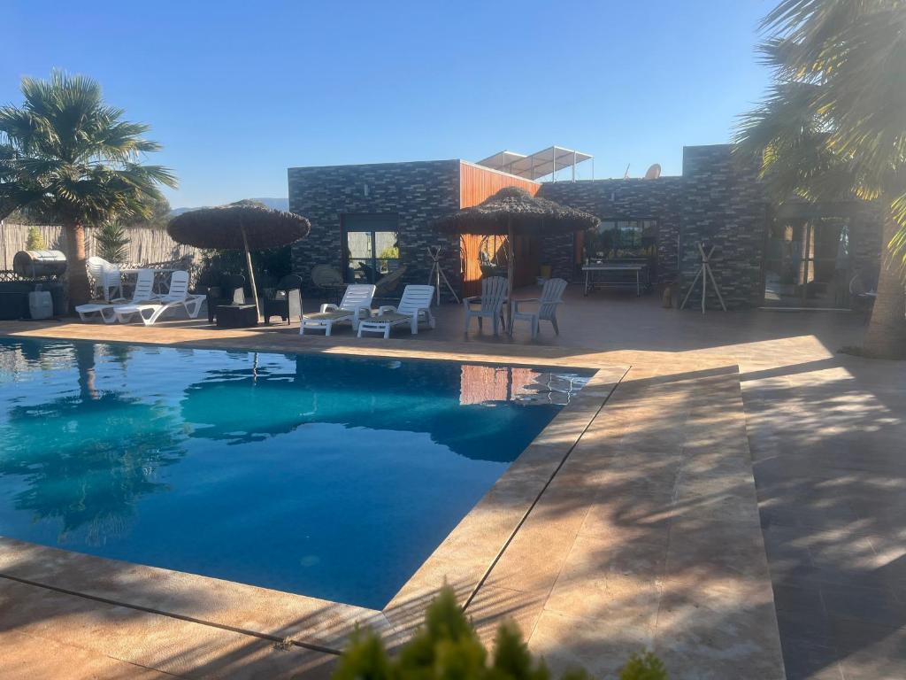 Bazén v ubytování Villa Berkania piscine privée - 8 pers nebo v jeho okolí