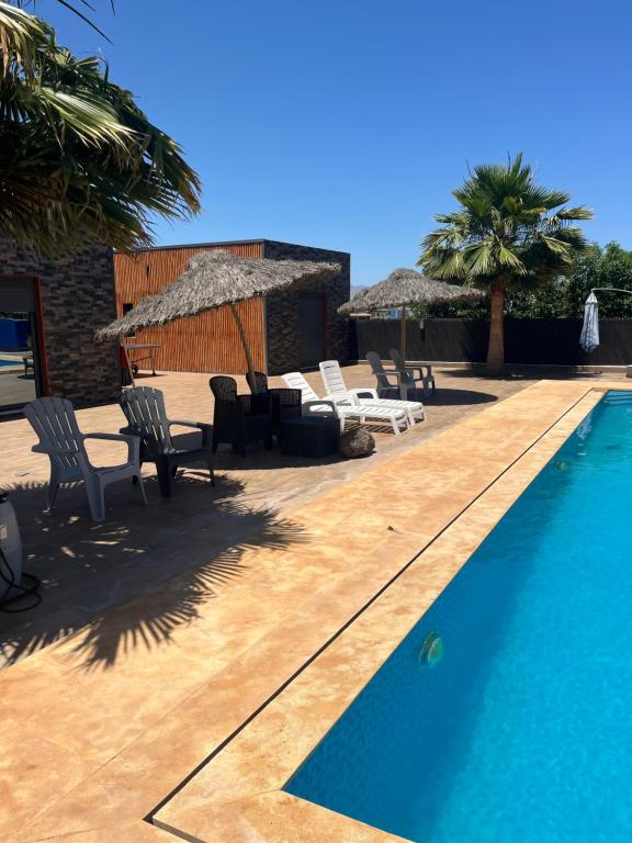 Bazén v ubytování Villa Berkania piscine privée - 8 pers nebo v jeho okolí