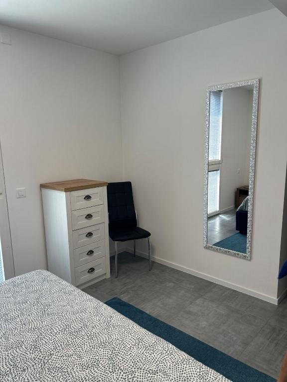 Postel nebo postele na pokoji v ubytování LabPark design Melano