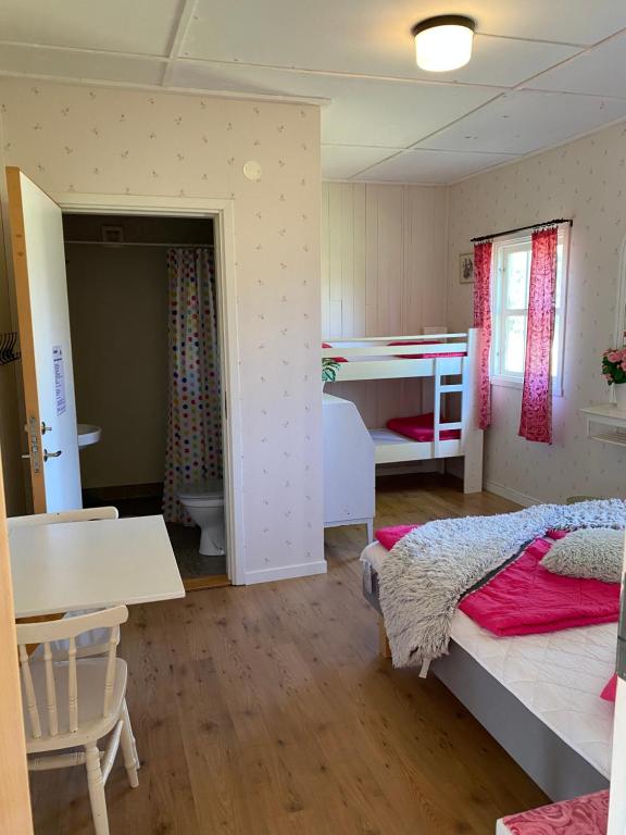 Postel nebo postele na pokoji v ubytování Valle vandrarhem och camping