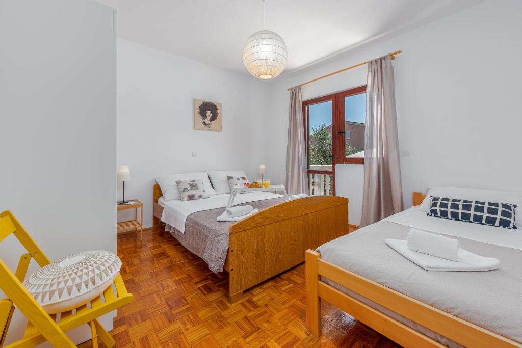 Posteľ alebo postele v izbe v ubytovaní Villa Pine ZadarVillas