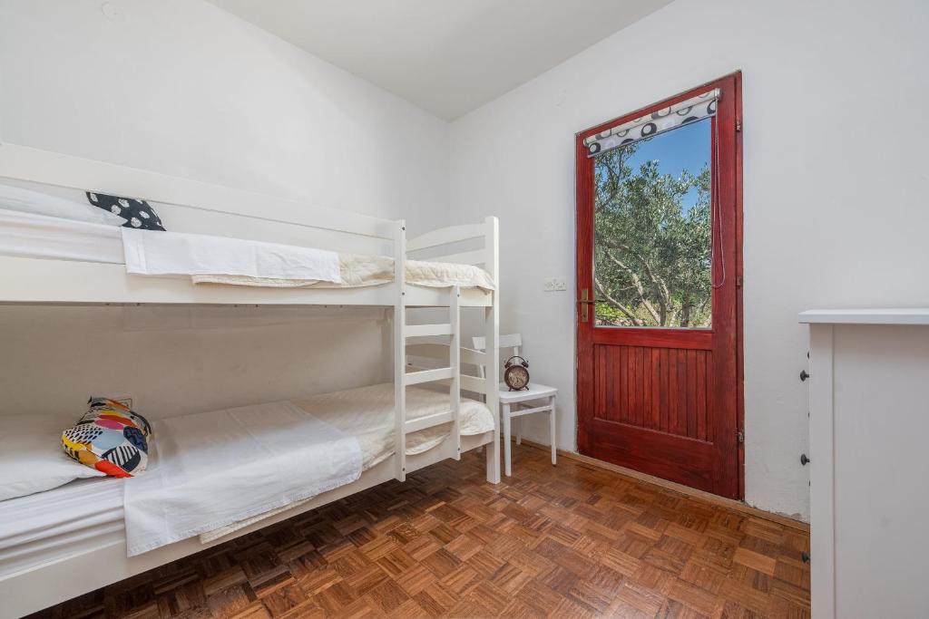 Posteľ alebo postele v izbe v ubytovaní Villa Pine ZadarVillas