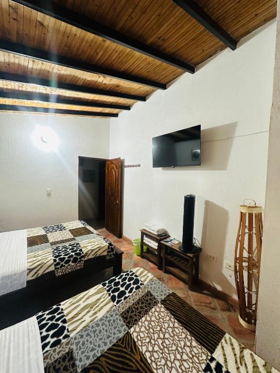 A television and/or entertainment centre at Casa Hotel Camino Real