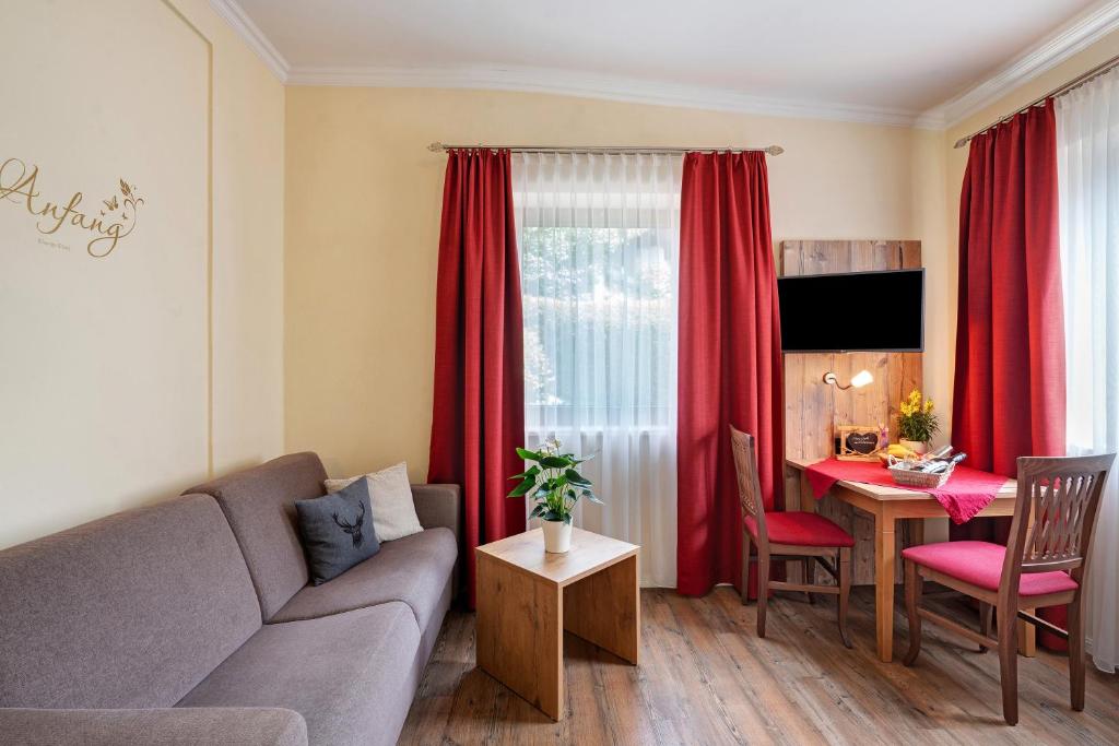 TV a/nebo společenská místnost v ubytování Komfort Apartment Römersberger - 1