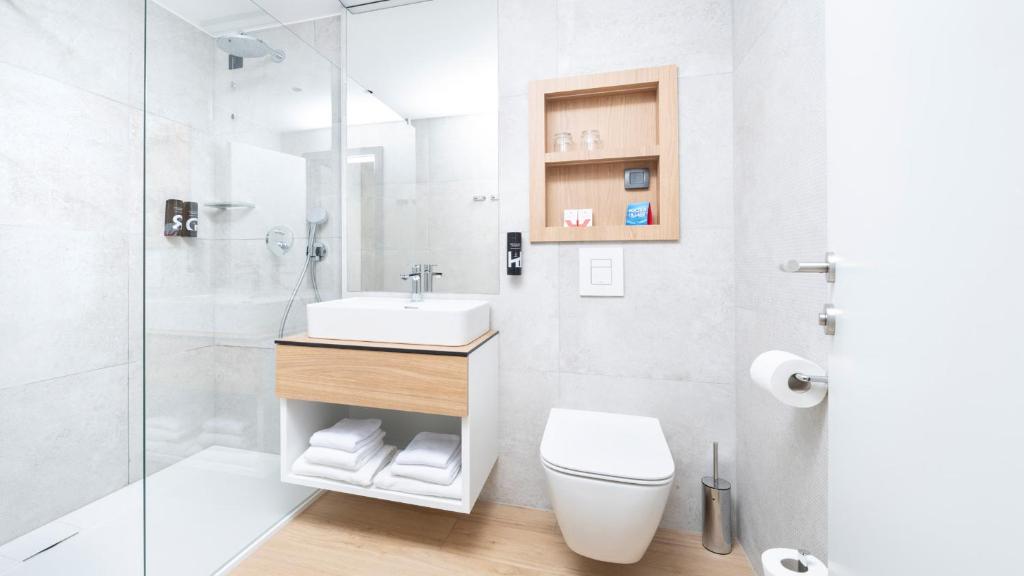Koupelna v ubytování Hotel Pelegrin Plava Laguna