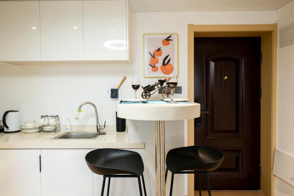 Kuchyň nebo kuchyňský kout v ubytování Bundside NJE 3BR Suite