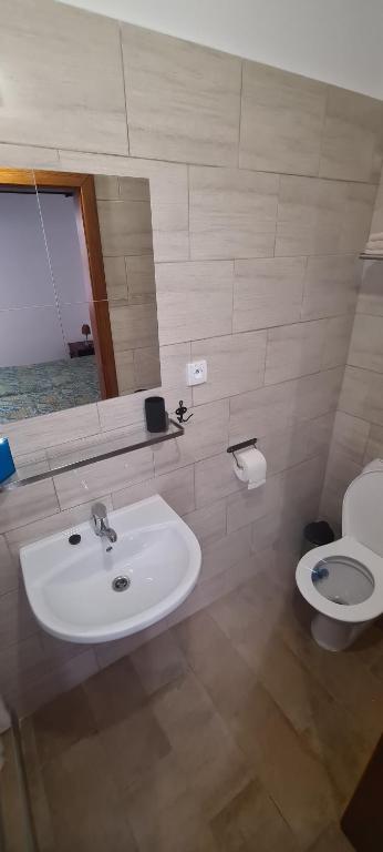 Koupelna v ubytování Apartmány Bardi