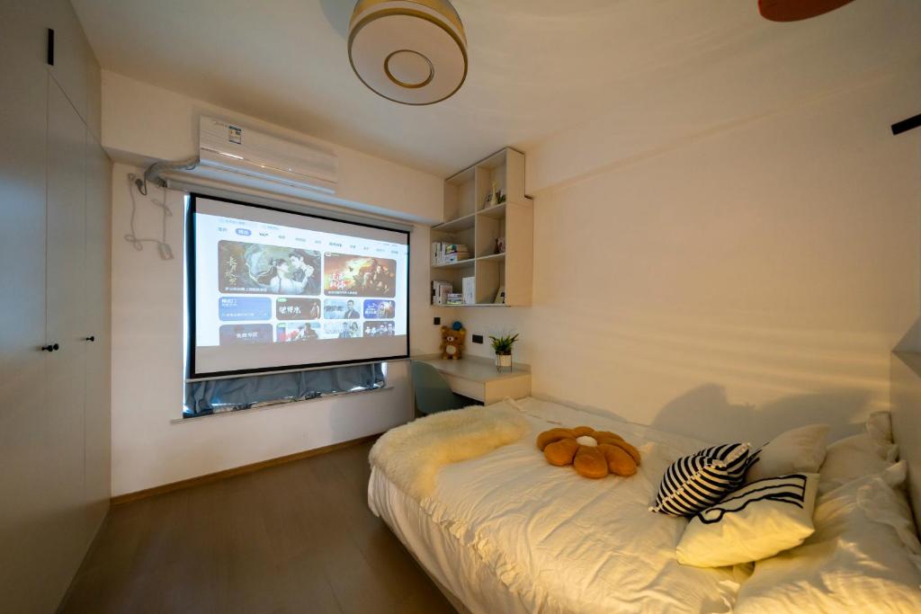 Postel nebo postele na pokoji v ubytování Bundside NJE 3BR Suite